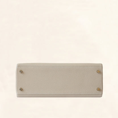 Hermès | Trench Togo Retourne Kelly - Gold Hardware | 32