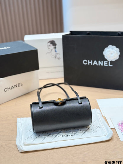 Chanel 26P Black Gold Cylindrical Bag